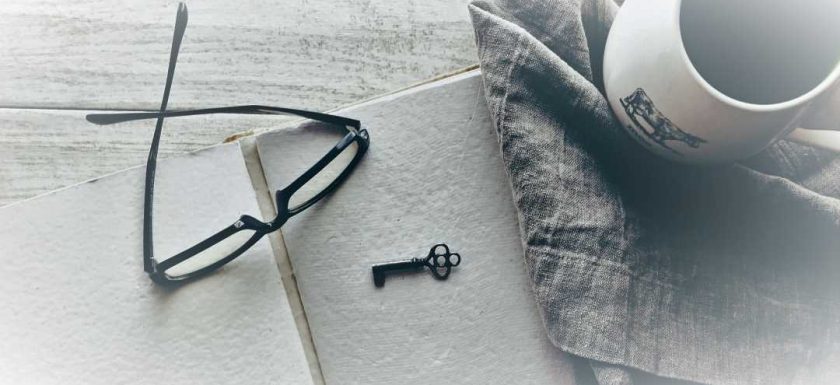 still-life of journal and glasses