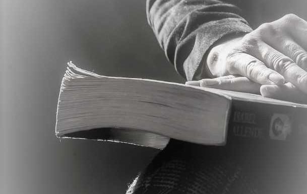An Old woman's hand resting on a book Caroline Howard Jarvey